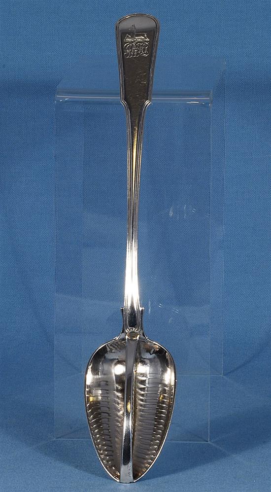 A George III silver straining spoon, Length 12”/305mm Weight: 5.3oz/149grms.